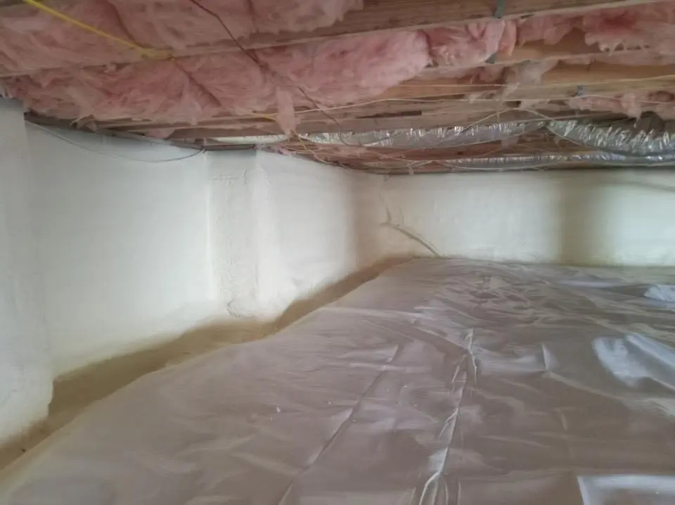 Crawl space encapsulation with closed-cell spray foam for Commercial Roof Restoration in Channahon